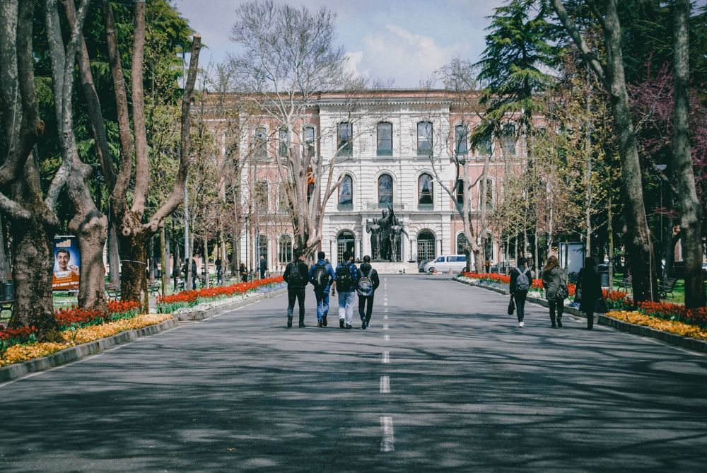 Students walking towards a campus building